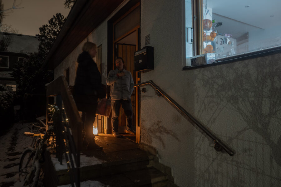 Berlin, 5 January 2026. Woman Brings Hot Water And Coffee Door To Door.